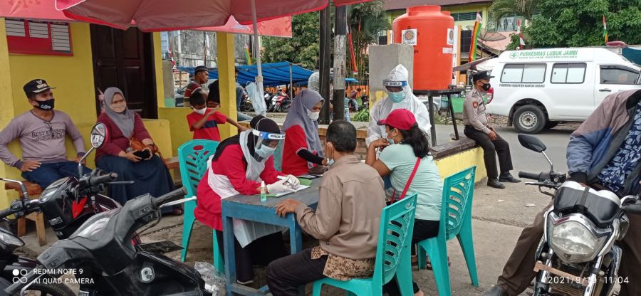 Kapolsek Kuantan Mudik Pimpin Razia PPKM di Pasar Lubuk Jambi